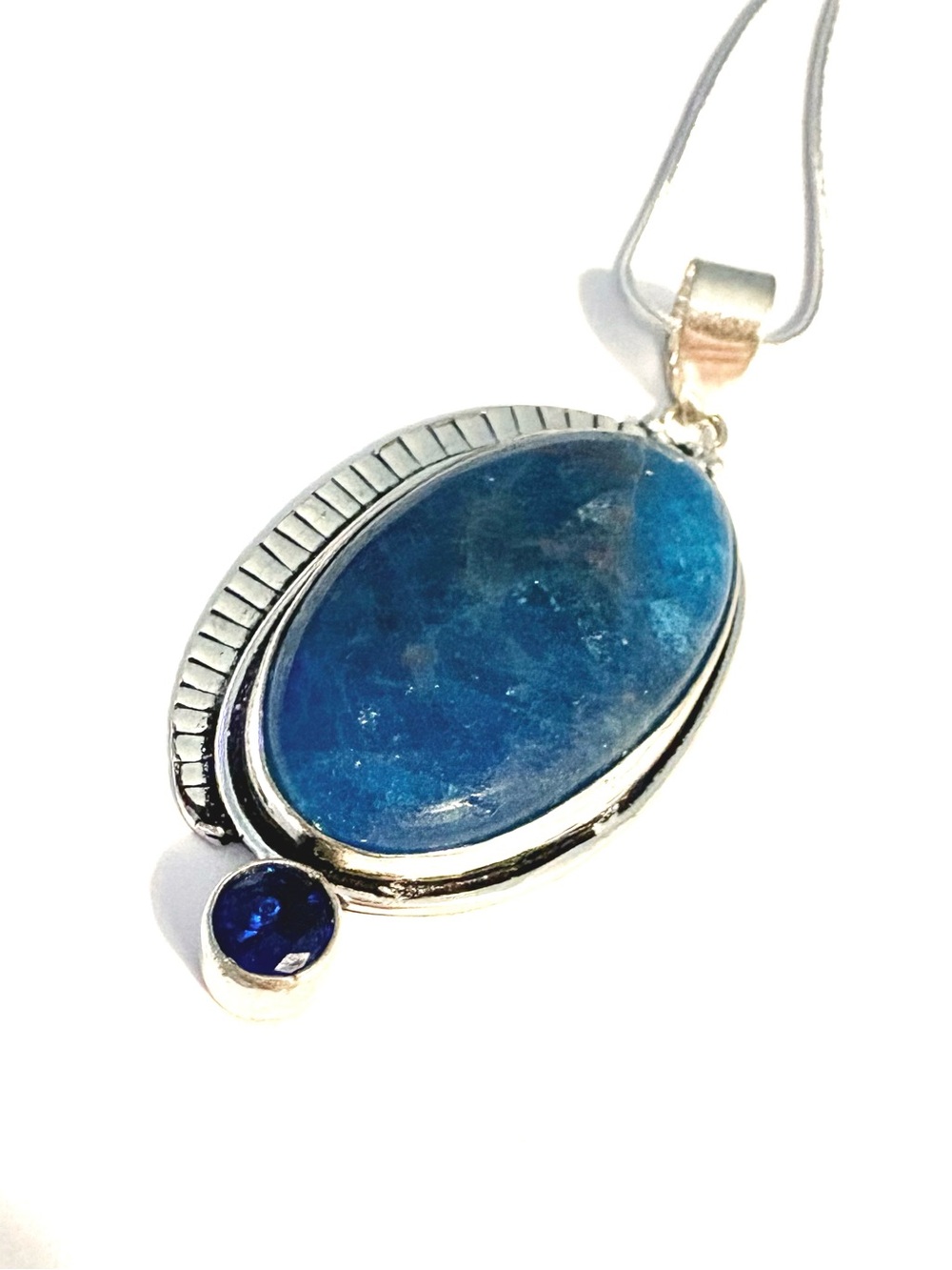 Gorgeous, 2 inch, Apatite and Tanzanite pendant on a silver chain.